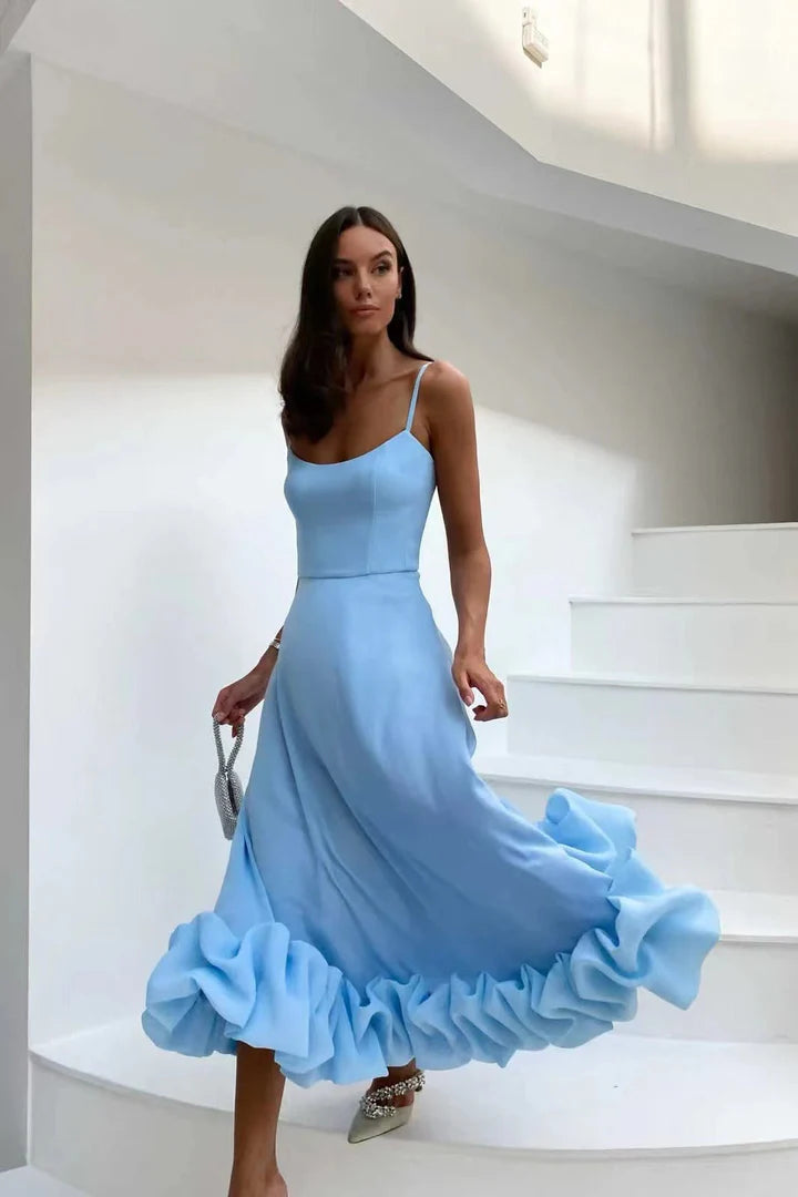Ophelia – Refined Sleeveless Dress with Dramatic Ruffle Bottom