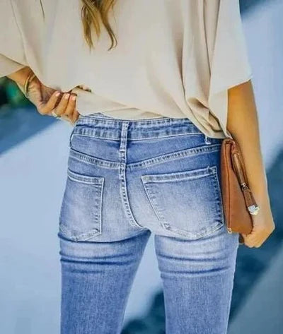Olivia - High-Waisted Flared Jeans with Button Detail