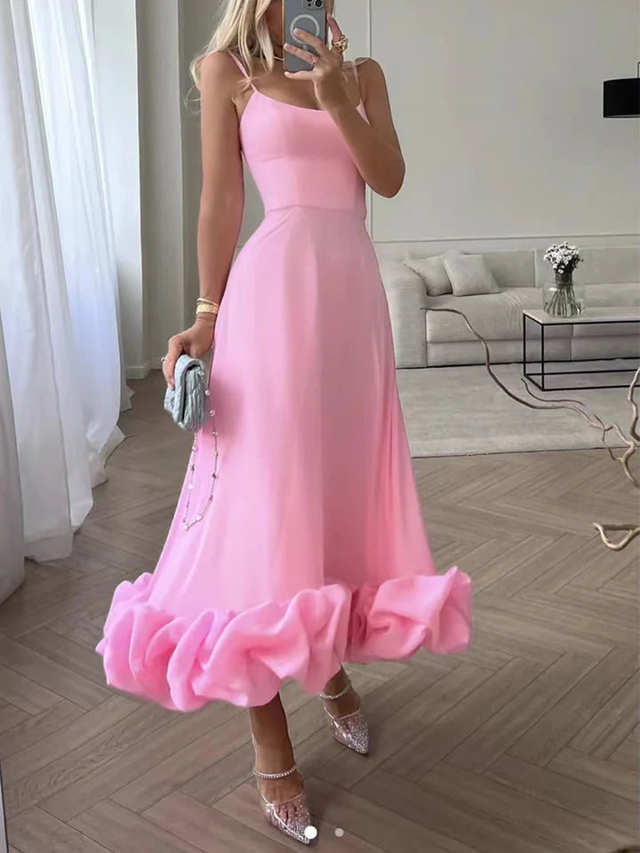 Ophelia – Refined Sleeveless Dress with Dramatic Ruffle Bottom