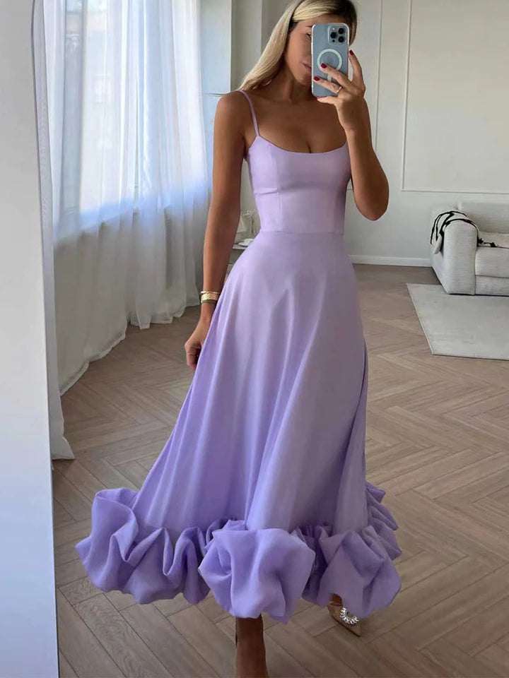 Ophelia – Refined Sleeveless Dress with Dramatic Ruffle Bottom