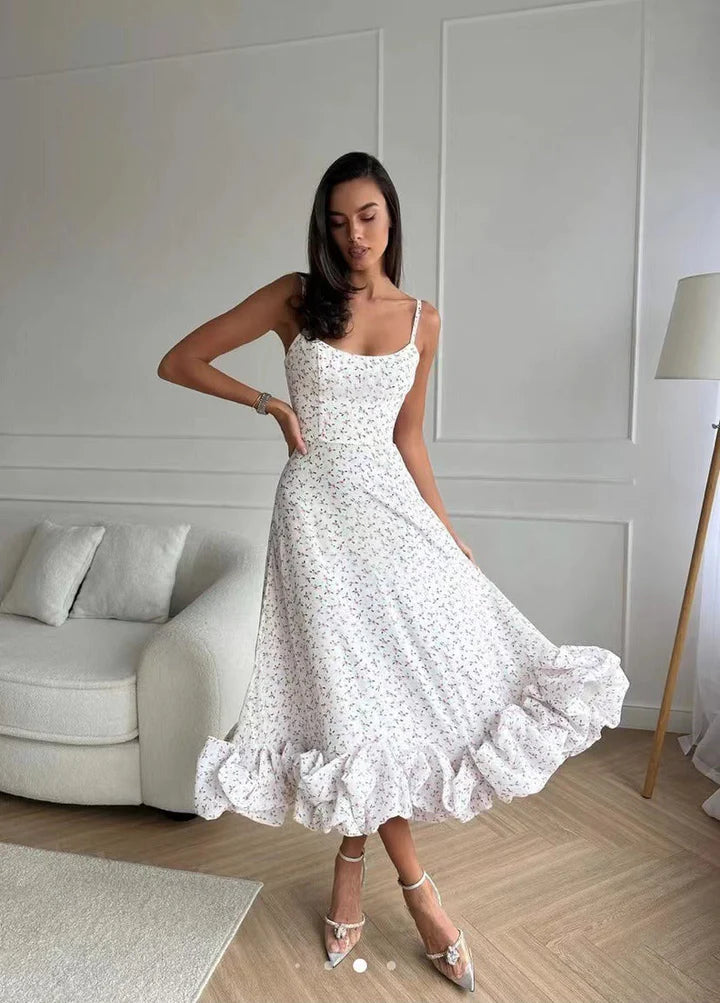Ophelia – Refined Sleeveless Dress with Dramatic Ruffle Bottom
